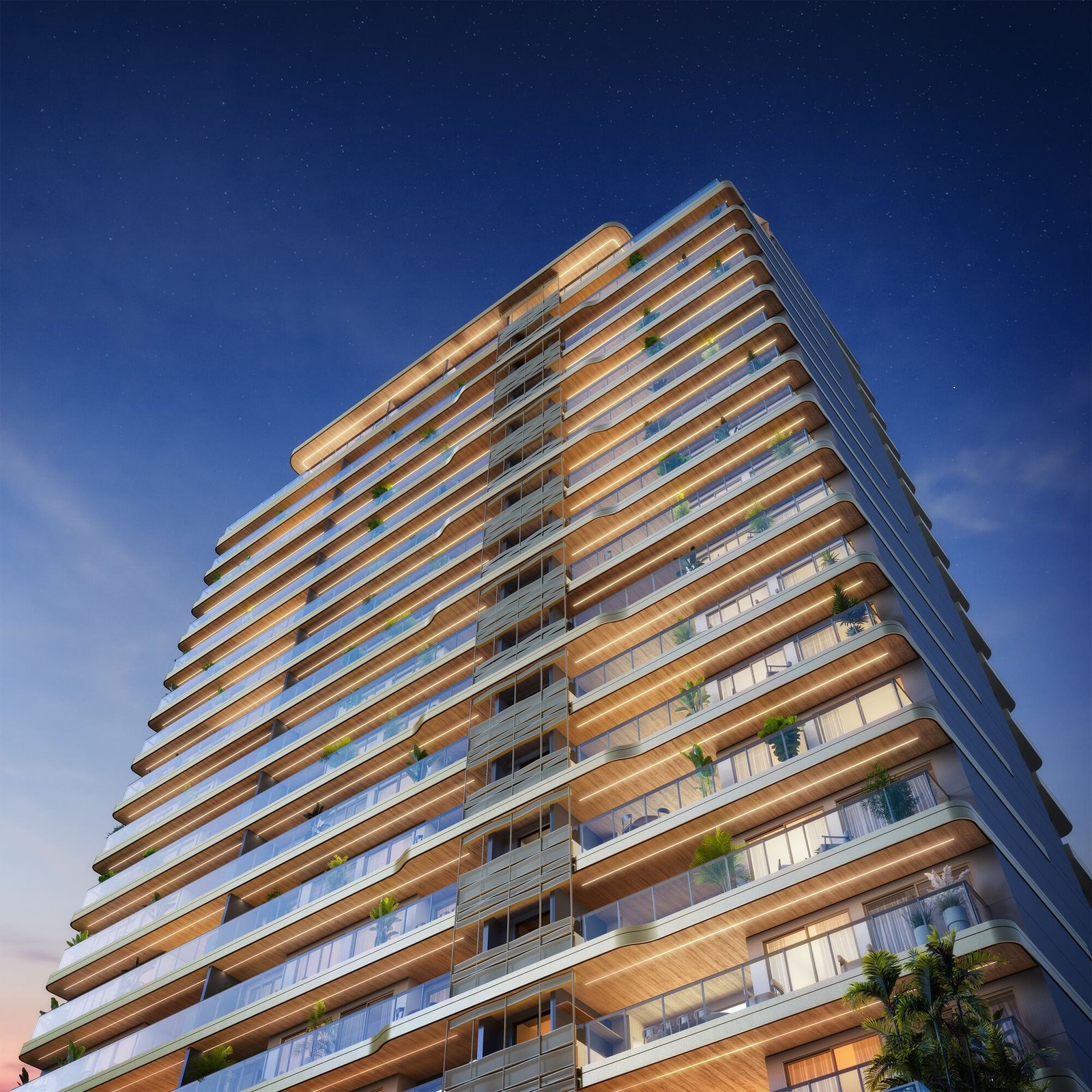 Fachada iluminada ao anoitecer — Marino by Breton, Barra da Tijuca